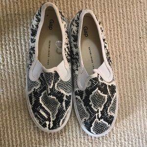 Snake skin slip ons